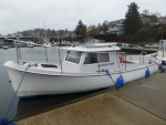 Not sure what kind of boat this is, but looks seaworthy enough to cruise anywhere in the world!