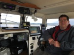 Jody Kidd at the helm of his CD22 Voyager as we were headed out to fish