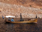 Steam powered 23 foot wooden dory also named Hunkydory.