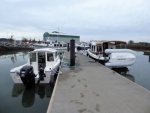 There is company at the dock in the form of another boat, but no people around unfortunately