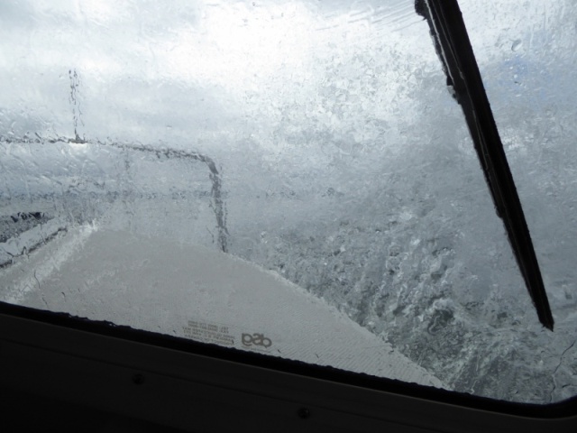 Almost every other wave was splashing over the bow...not the most pleasant whale watching weather!