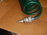 Plumbing bits to adapt standard faucet coil hose to my washdown receptacle.