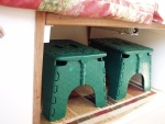 Folding Foot Rests Stored Under Table (Note: Barrel Bolt on Left)