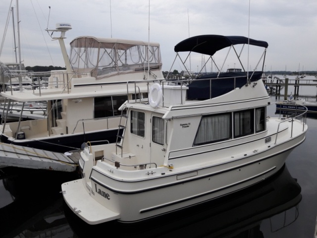 Slow Lane at the marina where I bought her. Next to a nice Mainship 40 trawler