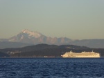 Sun setting on Mount Baker and a passing cruise ship