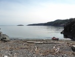 Taking a stretch break on a beach in Telegraph Bay