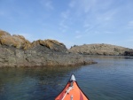 Exploring the various rock formations on the outside of Watmough bay