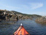 Exploring the various rock formations on the outside of Watmough bay