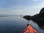 Exploring the various rock formations on the outside of Watmough bay