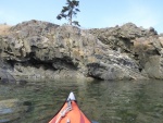 Exploring the various rock formations on the outside of Watmough bay