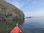 Exploring the various rock formations on the outside of Watmough bay