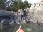 Exploring the various rock formations on the outside of Watmough bay