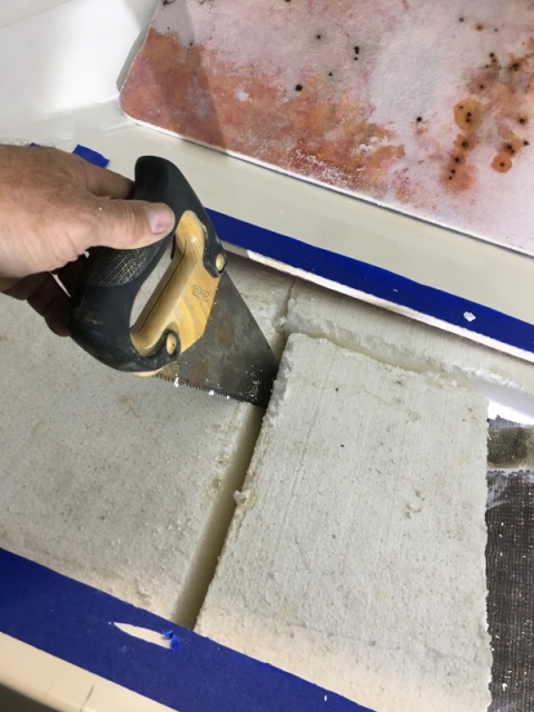 A small hand saw turned out to be the best tool for removing the styrofoam. 