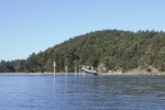 A mostly empty Fossil Bay, Sucia Island. Inner Dock #2 not yet returned for the season.