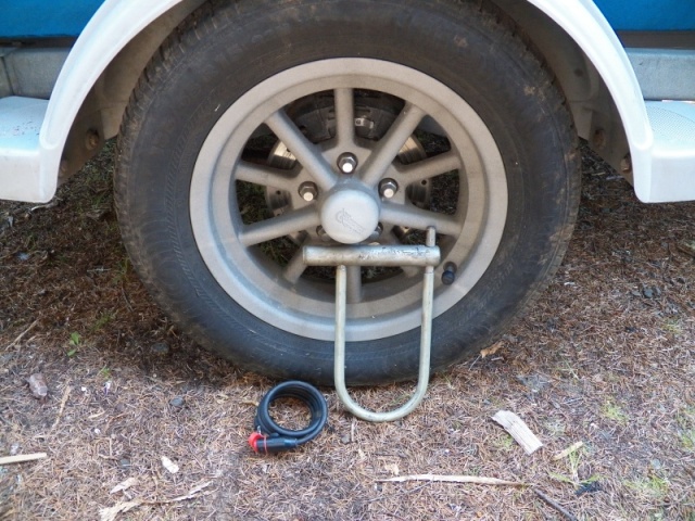 I have two ways to lock my wheels and tires, both bike locks.  When locked, the wheel can't turn and is locked to the leaf spring.  Since the wheels can't turn, I don't use a hitch lock, but I do remove the pin from the folding hitch.