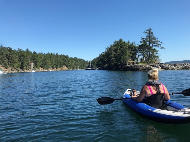 Rosanne kayaking into Princess Bay, Wallace Island.