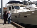 With Tony Fleming, designer of the the Fleming Yacht line in front of his first Fleming Yacht, which he still owns & cruises, the 65 foot Venture