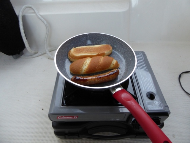 A Brat eating a brat for dinner