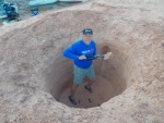 Digging a hole for the anchor at Oak Bay.