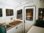 Galley before stripping cabinetry.