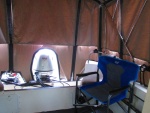 Interior camperback with shades on windows to protect from sun.