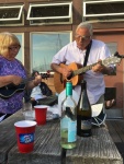 Patty and Pat leading the sing-along after the potluck on Saturday night