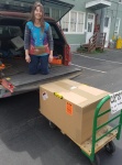 Dana loading up the huge Spectra watermaker box.