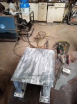 Fabricating an aluminum mount for the Clark pump.