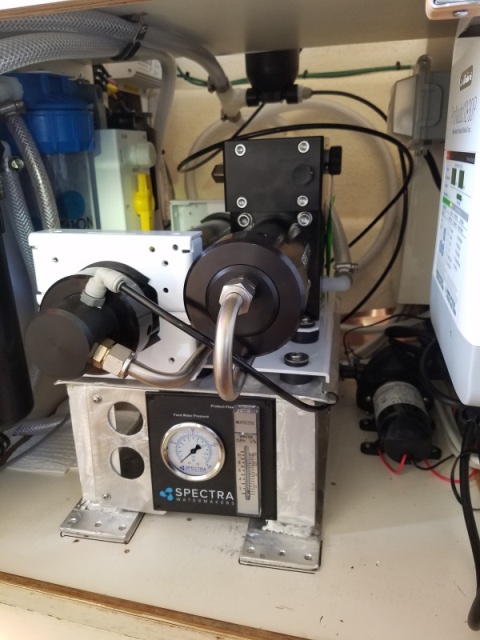 Almost finished, the flowmeter and pressure gauge were hard to find a convenient spot for. In the background you can see the copper foil that is the caries the ground plane from the SSB transceiver antenna tuner to the through hulls under the step where it is well bonded.