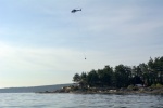 Helicopter transporting cement from Gabriola to Entrance Island