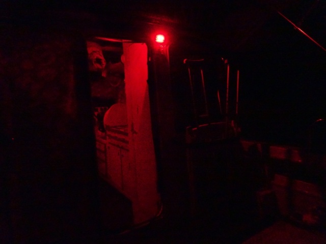 Outside red light above the cabin door.  We always leave this on when we are gone from the boat at night.  It is bright enough for us to get aboard, (dinghy or dock0 and find the door etc, yet does. not draw the bugs as a white light will. 