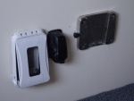 from outboard: water resistant 110 v plug for freezer, 12 volt plug for freezer and holder for cockpit table.