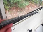 A grubby sliding strip showing why the C-Dory windows lose their slipperiness.  Installation is the reverse of removal, but getting the plastic strips to set back in right was time consuming.  They 