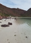 The beautiful long soft white sand beach in Ensenada Partita bay.