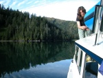 Three Fingers Cove, Cochrane Bay, 9-4-06, Robin tying down the dingy