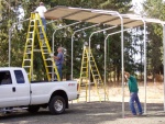 (CatyMae n Steve) Wow, that's tall!  Steve's on a 12 foot ladder in the bed of the truck!