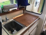 KISS stove removed and Butcher Block (Oak board) installed.