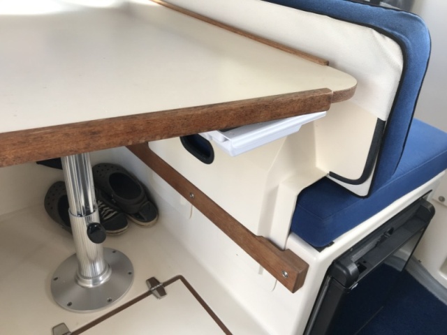 Installed drawer under table.