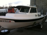 Early 80's 16-footer (Anchorage AK, April 2014). This was in the lot at the outboard shop when I dropped mine off for a tune up. Very nice shape.