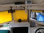 01 before - helm shelf with VHF, stereo and bus bar in the middle right behind the stereo