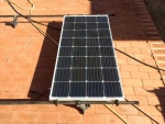 160 watt Renolgy solar panel mounted to the Desert Dory roof rack.