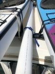 PVC Fender storage - keep it tied to roof rack then simply lift over kayak and hold with 2 ft cinch stops (ft & rr) 