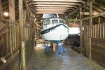 Trailer removed and jack stands in high position with initial blocking under keel