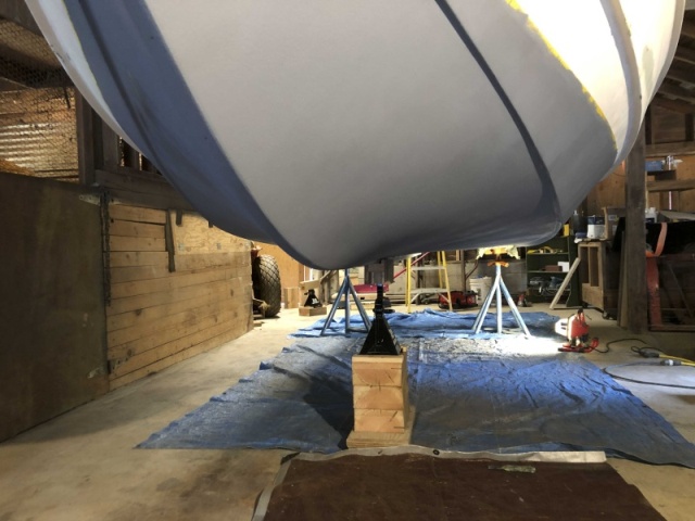 After the bottom of the hull was repaired I lowered the boat and supported it in three locations while I applied bottom paint.