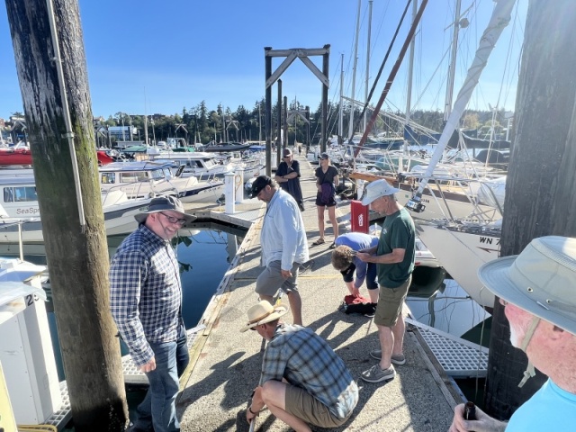 Phone overboard- taping poles together to go fishing