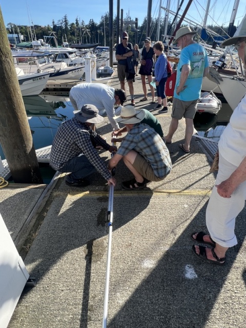 Phone overboard- taping poles together to go fishing