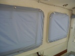 Window covers. SuperMicroft, a light-weight water-repellent polyester.  Lined with cotton-poly.  Snapped to window frames.