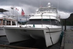 Kiwi Cat..We were the big Cat on the dock until this gal came in. Camera boat for the America's Cup.