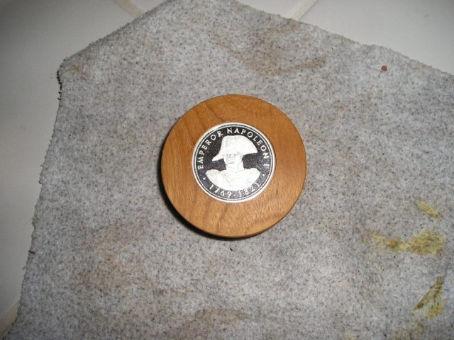 Inset coin in a teak hub made for C-Dory Napoleon