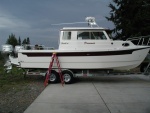 Dreamer still moored in the driveway.  Neighbors haven't complained yet..  Most have come over for a tour.